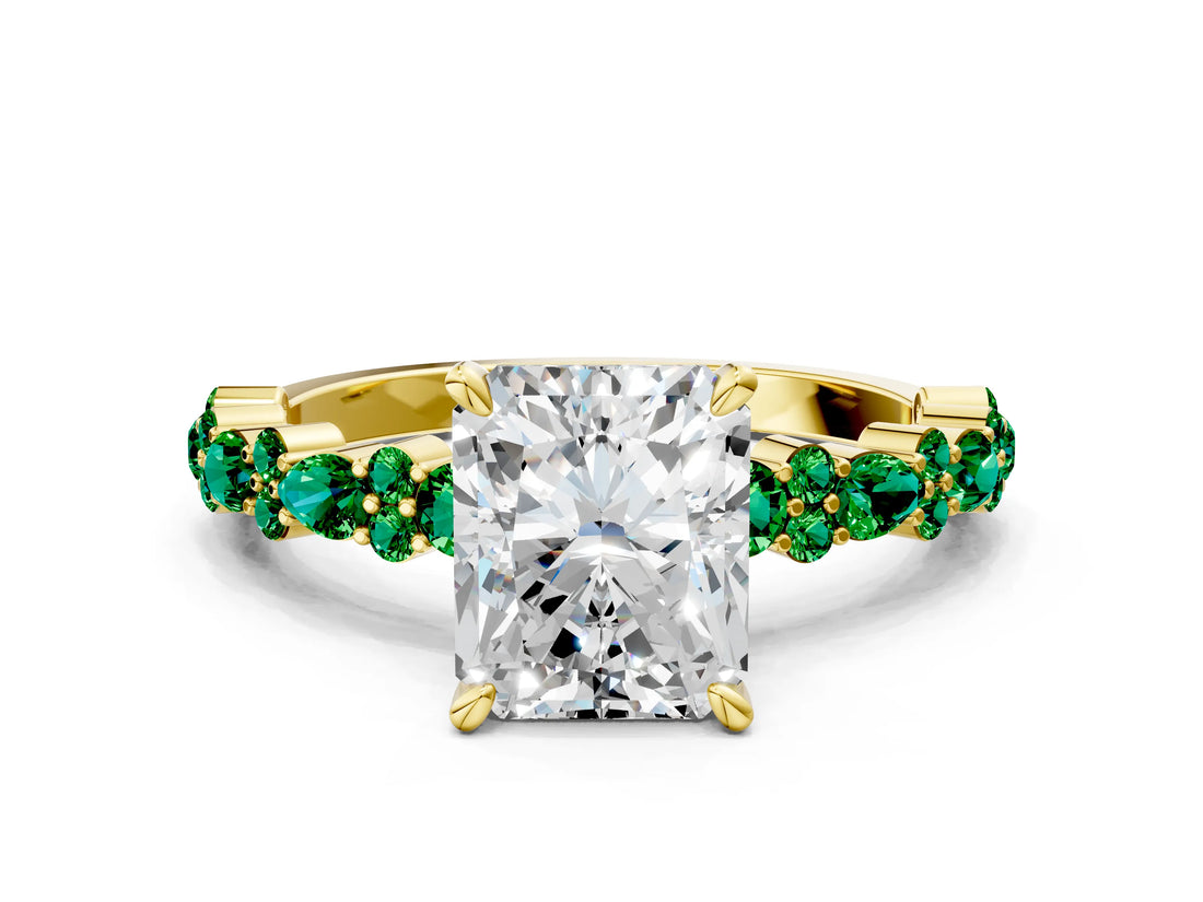 Yellow gold Radiant Cut Diamond Side Stone Solitaire Ring with Round with Emerald side stone and Four-Prong Setting