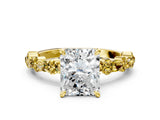 Yellow gold Radiant Cut Diamond Side Stone Solitaire Ring with Round with Yellow Sapphire side stone and Four-Prong Setting