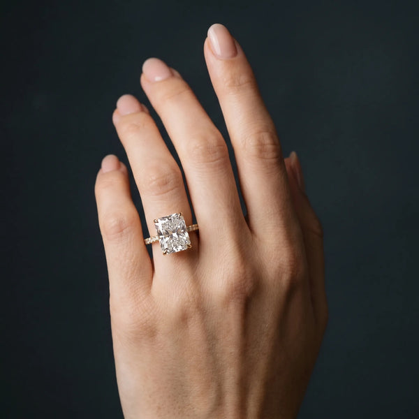 Yellow gold Radiant Cut Diamond Solitaire Engagement Ring with Cathedral Setting and Four-Prong Mount