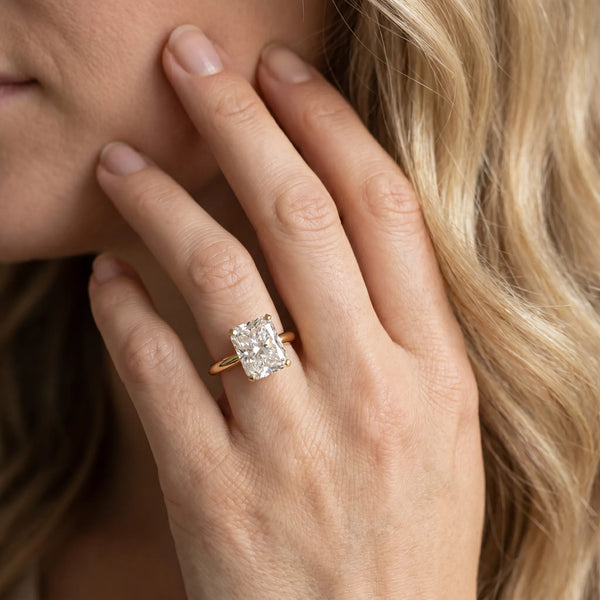Yellow gold Radiant Cut Diamond Solitaire Engagement Ring with Classic Band and Four-Prong Setting