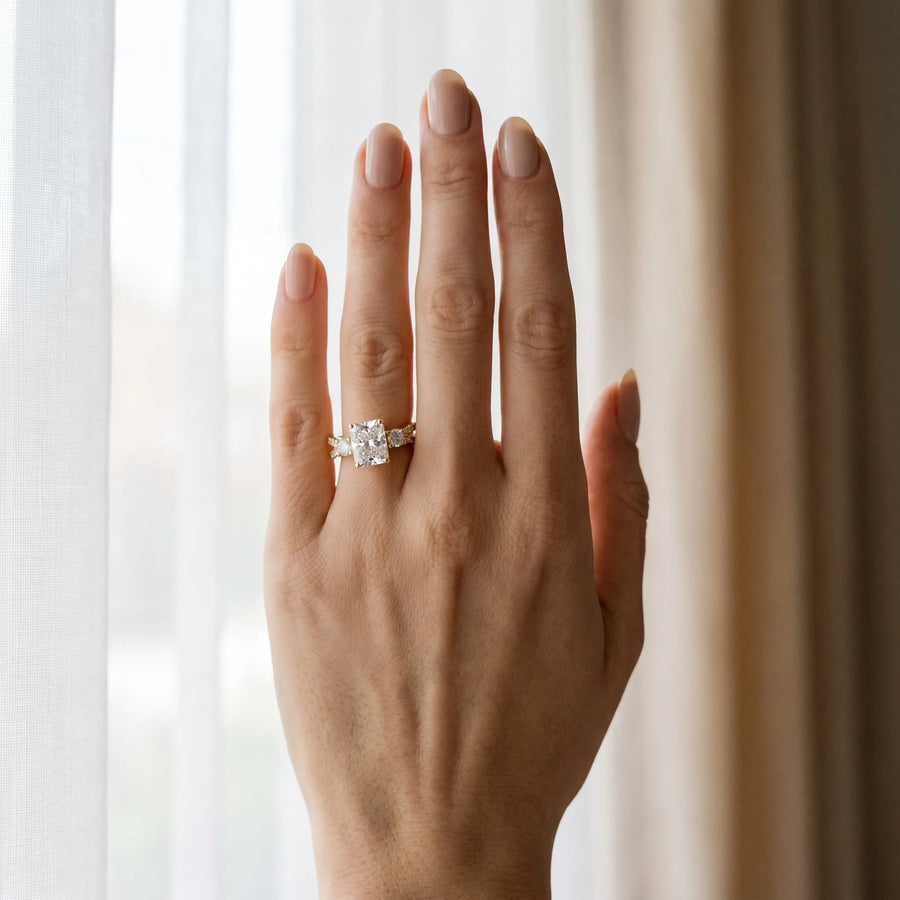 Yellow gold Radiant Cut Diamond Three-Stone Ring with Pavé Split Shank and Four-Prong Setting