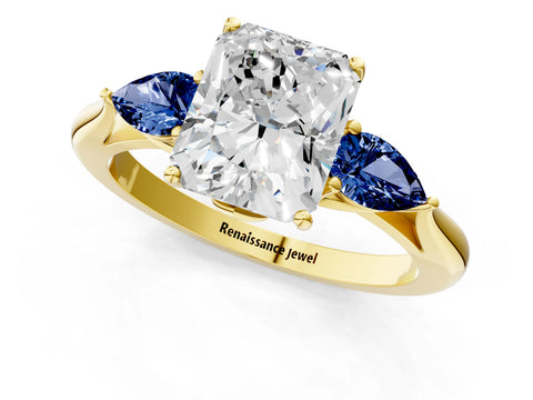 Yellow gold Radiant Cut Diamond Three-Stone Ring with Pear with Blue Sapphire side stone Side Stones and Prong Setting_1