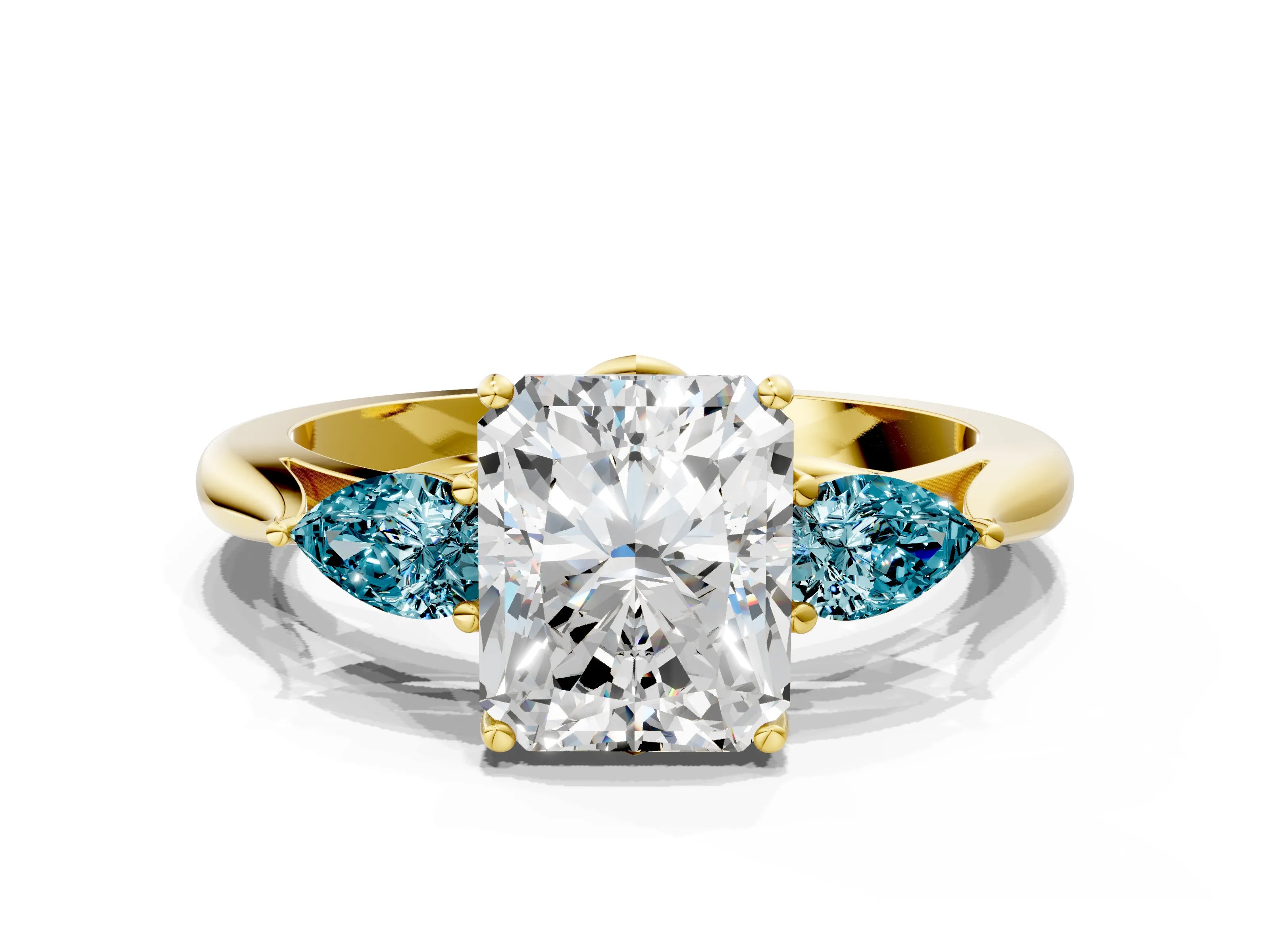Yellow gold Radiant Cut Diamond Three-Stone Ring with Pear with Blue Topaz side stone Side Stones and Prong Setting