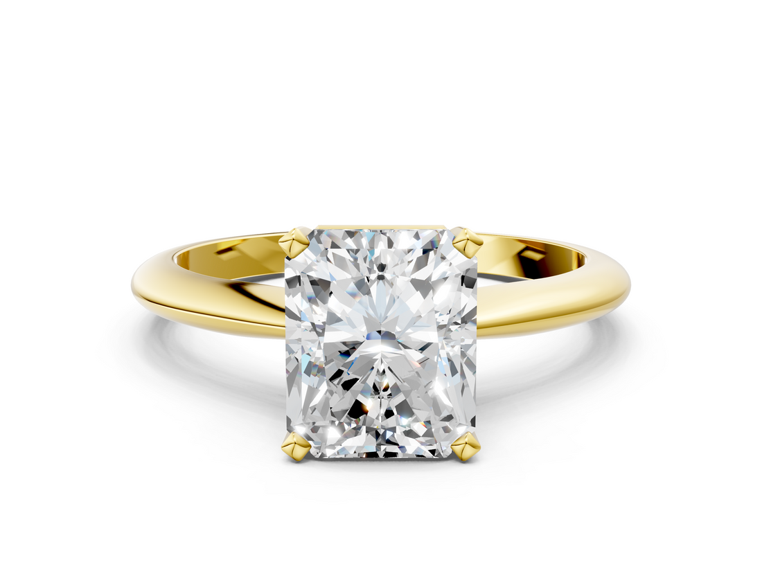 Yellow gold Radiant Cut Solitaire Ring with Four-Prong Setting on a Classic Band_40