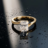 Yellow gold Radiant Cut Solitaire Twist Band Ring with Four-Prong Setting_15