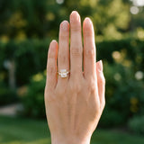 Yellow gold Radiant Cut Three-Stone Solitaire Ring with Round Accent Diamonds and Four-Prong Setting_12