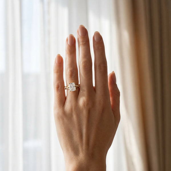 Yellow gold Radiant Cut Twist Band Solitaire Diamond Ring with Pavé Setting