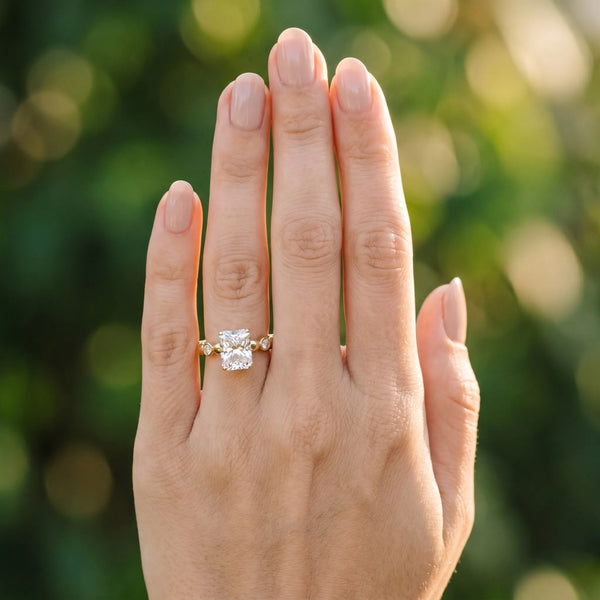Yellow gold Radiant Solitaire Bezel-Set Diamond Ring with Beaded Band and Four-Prong Setting