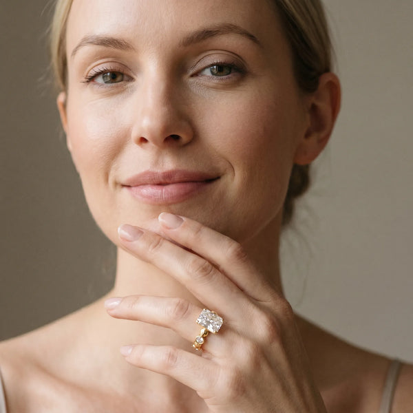 Yellow gold Radiant Solitaire Bezel-Set Diamond Ring with Beaded Band and Four-Prong Setting