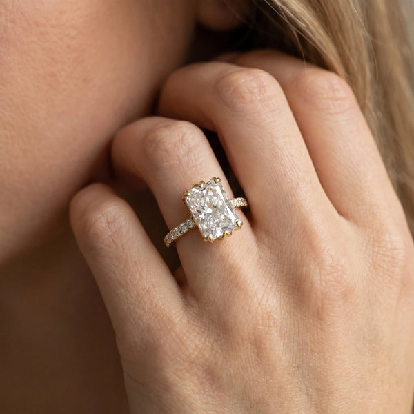 Yellow gold Radiant Solitaire Diamond Engagement Ring with Pave Band and Six-Prong Setting