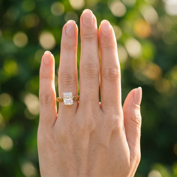 Yellow gold Radiant Solitaire Diamond Engagement Ring with XO Engraved Band and Four-Prong Setting