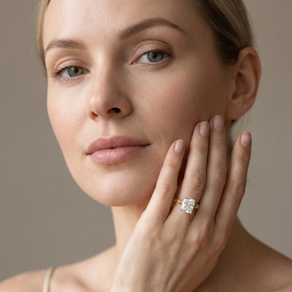 Yellow gold Radiant Solitaire Diamond Engagement Ring with XO Engraved Band and Four-Prong Setting