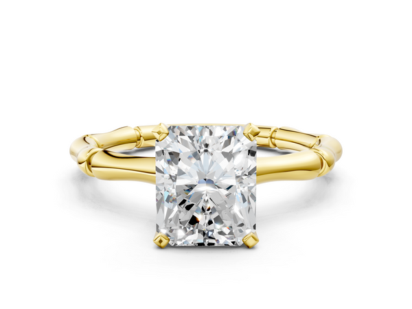 Yellow gold Radiant Solitaire Diamond Ring with Bamboo Band and Four-Prong Setting