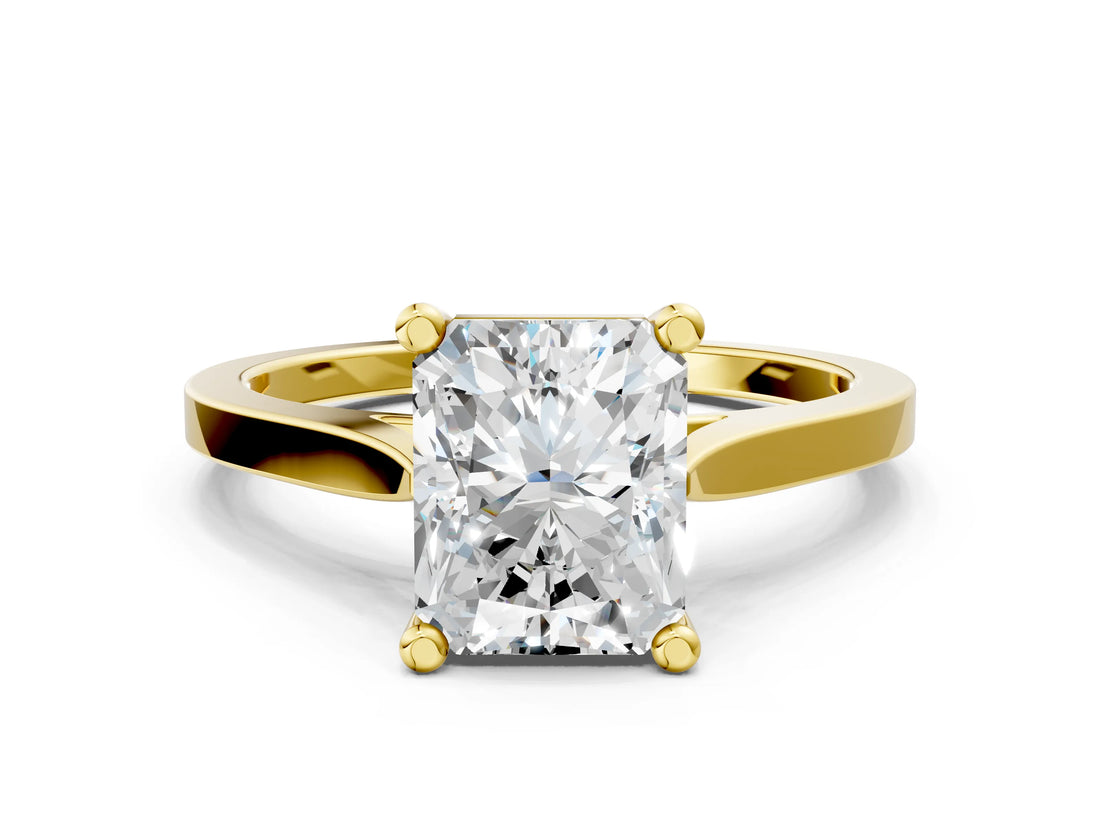 Yellow gold Radiant Solitaire Diamond Ring with Four-Prong Setting and Tapered Band 1