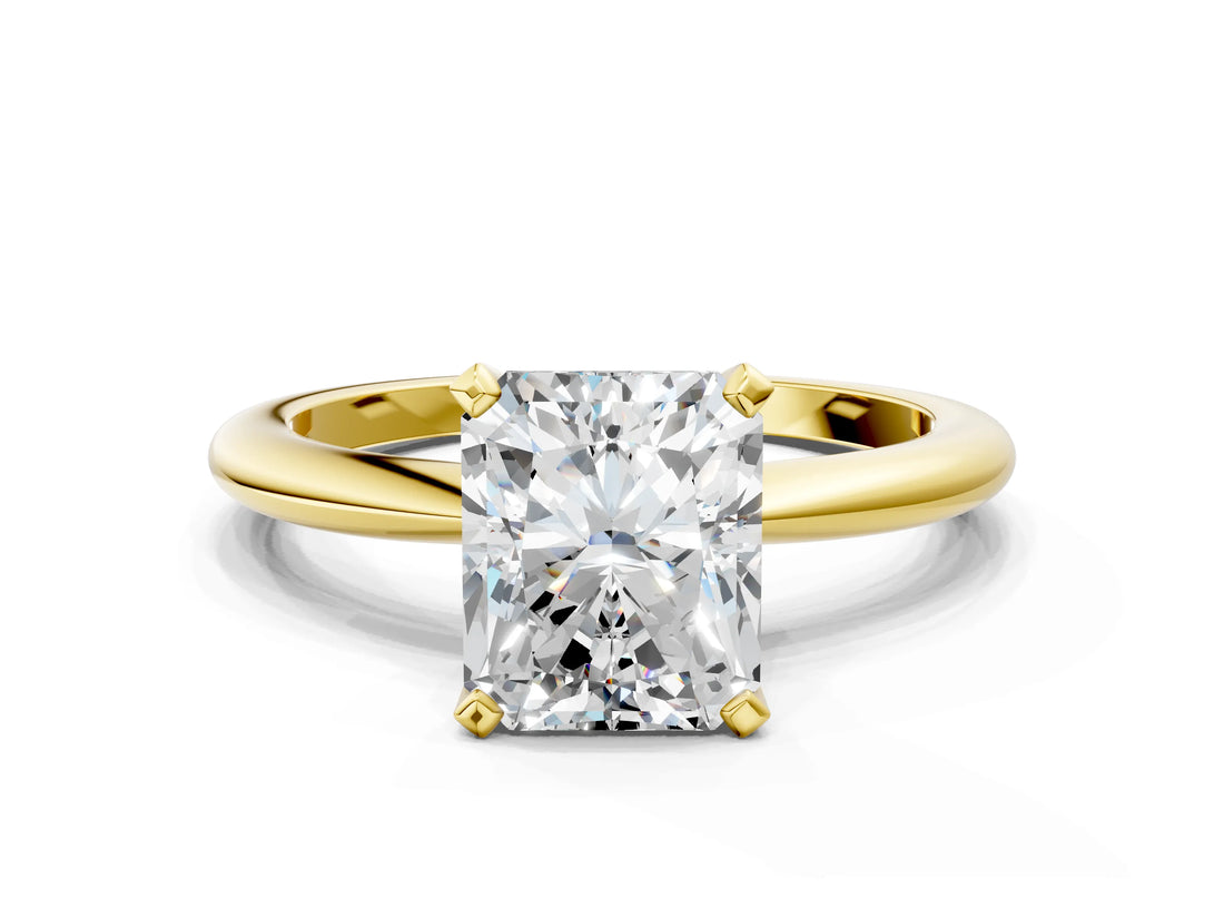 Yellow gold Radiant Solitaire Diamond Ring with Six-Prong Setting on a Classic Band