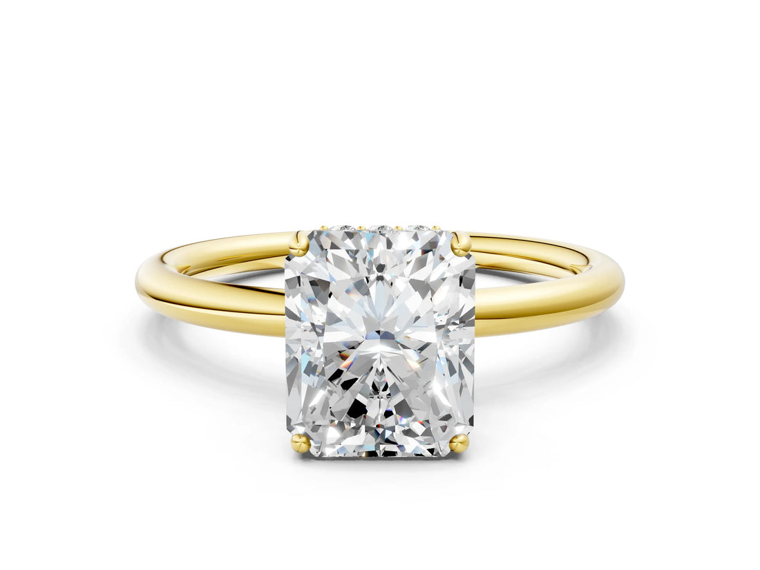 Yellow gold Radiant Solitaire Diamond Ring with a Classic Band and Four-Prong Setting