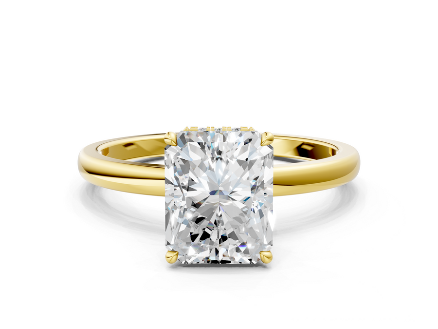 Yellow gold Radiant Solitaire Engagement Ring with Cathedral Band and Four-Prong Setting