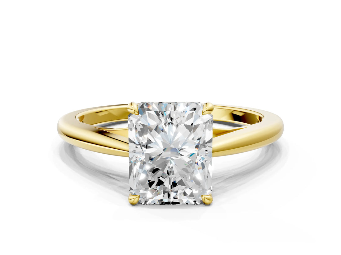 Yellow gold Radiant Solitaire Engagement Ring with Four-Prong Setting and Classic Band
