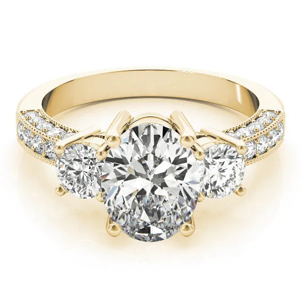 Yellow gold Radiant Three-Stone Diamond Ring with Pavé Band and Four-Prong Setting