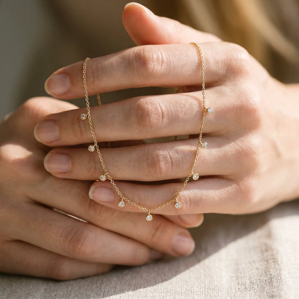 Yellow gold Round Bezel Set Diamond Station Necklace with Cable Chain