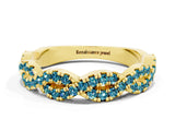 Yellow gold Round Blue Topaz Twisted Eternity Band with Pavé and Shared Prong Setting_22