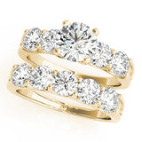 Yellow gold Round Brilliant Diamond Five-Stone Engagement Ring with Prong Setting on a Classic Band