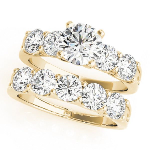 Yellow gold Marquise Brilliant Diamond Five-Stone Engagement Ring with Prong Setting on a Classic Band