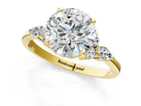 Yellow gold Round Brilliant Diamond Solitaire Ring with Pear Side Stones and Four-Prong Setting_11