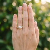 Yellow gold Round Brilliant Diamond Solitaire with Marquise and Pear Accent Stones on a Split Shank Band with Four-Prong Setting_12