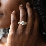 Yellow gold Round Brilliant Diamond Solitaire with Marquise and Pear Accent Stones on a Split Shank Band with Four-Prong Setting_14