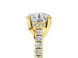 Yellow gold Round Brilliant Diamond Solitaire with Pavé Band and Four-Prong Setting
