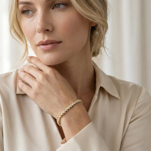 Yellow gold Round Brilliant Diamond Tennis Bracelet with Channel Set S-Shaped Prong Setting