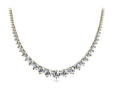 Yellow gold Round Brilliant Graduated Diamond Tennis Necklace with Four-Prong Setting