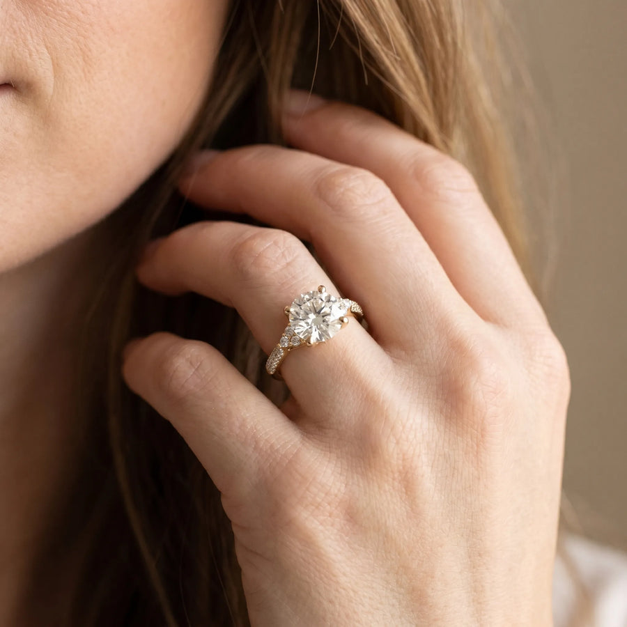 Yellow gold Round Brilliant Pave Diamond Engagement Ring with Cathedral Band and Four-Prong Setting