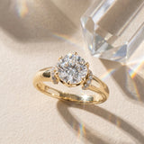 Yellow gold Round Brilliant Solitaire Cathedral Engagement Ring with Pave Accents_10