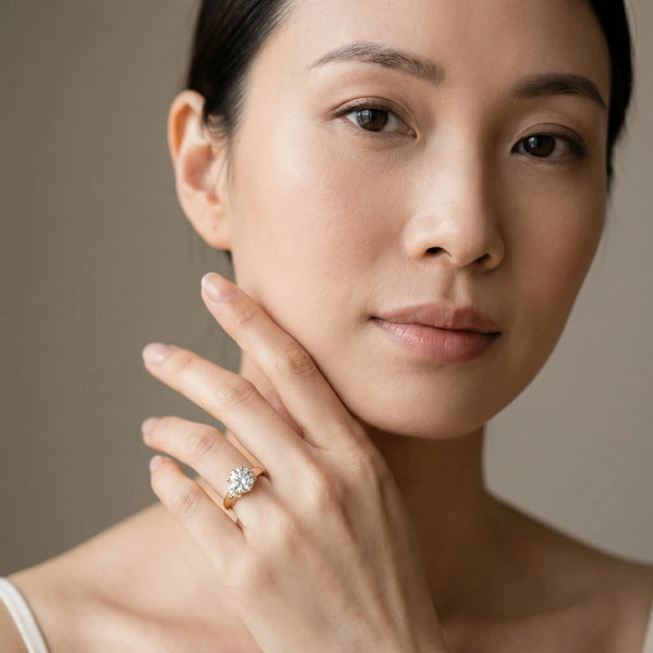 Yellow gold Round Brilliant Solitaire Cathedral Engagement Ring with Pave Accents