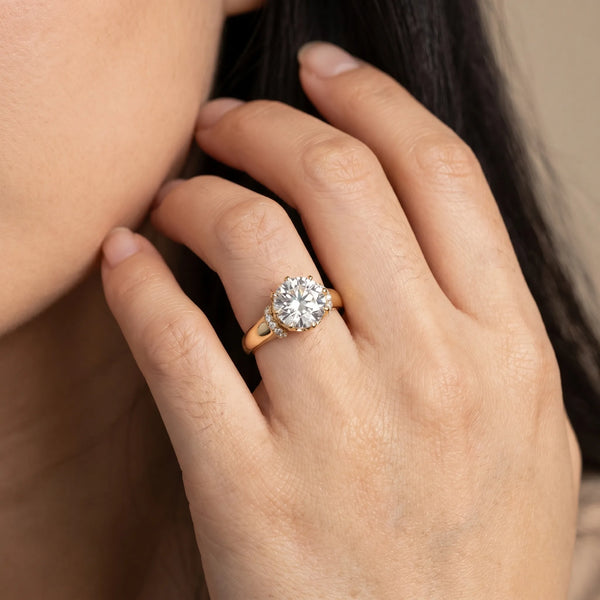 Yellow gold Round Brilliant Solitaire Cathedral Engagement Ring with Pave Accents