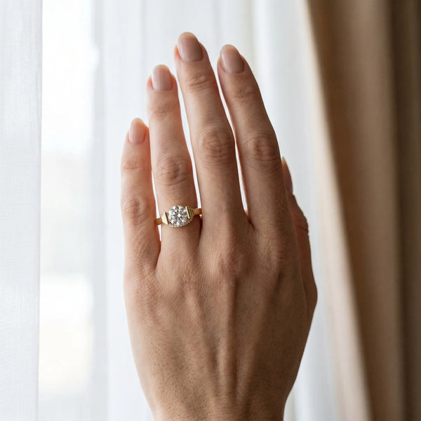 Yellow gold Round Brilliant Solitaire Diamond Ring with Channel Set Band and Bar Prong Setting