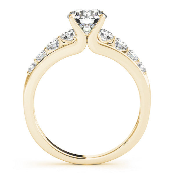 Yellow gold Round Brilliant Solitaire with Side Stones on a Pave Band and Four-Prong Setting 1