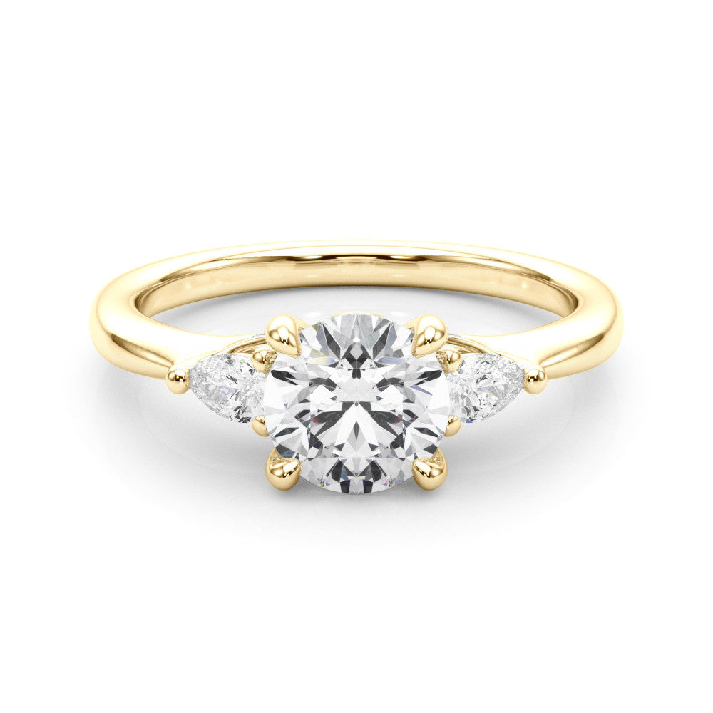 Yellow gold Round Brilliant Three-Stone Ring with Pear Side Stones and Four-Prong Setting 1