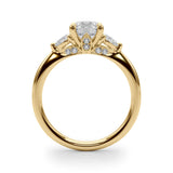 Yellow gold Round Brilliant Three-Stone Ring with Pear Side Stones and Four-Prong Setting 2