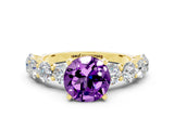 Yellow gold Round Cut Amethyst Prong Setting with Side Stones on a Pave Band