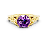 Yellow gold Round Cut Amethyst Solitaire Engagement Ring with Celtic Knot Band and Four-Prong Setting
