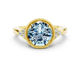 Yellow gold Round Cut Aquamarine Halo Ring with Tapered Band and Four-Prong Setting