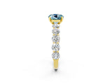 Yellow gold Round Cut Aquamarine Prong Setting with Side Stones on a Pave Band_2