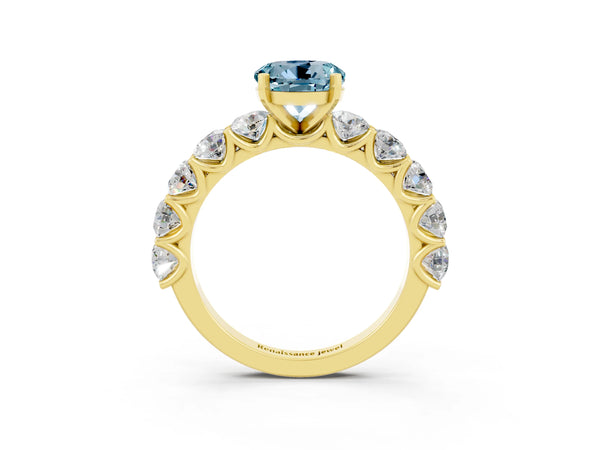 Yellow gold Round Cut Aquamarine Prong Setting with Side Stones on a Pave Band