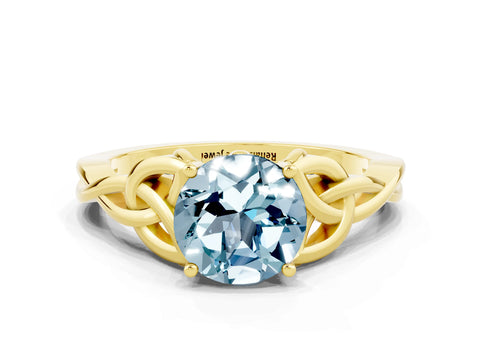 Yellow gold Round Cut Aquamarine Solitaire Engagement Ring with Celtic Knot Band and Four-Prong Setting