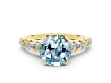 Yellow gold Round Cut Aquamarine Solitaire Ring with Cathedral Setting and Pavé Band