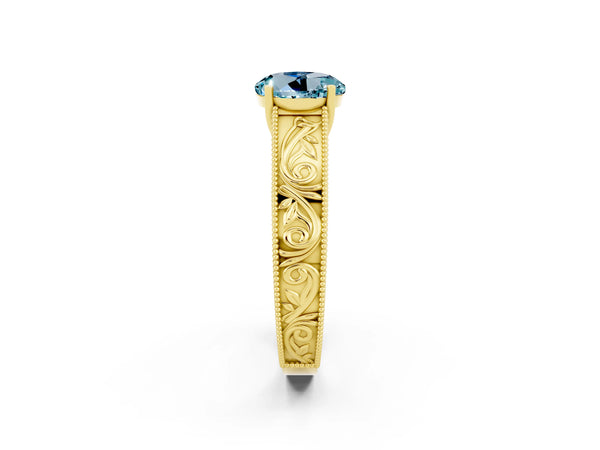 Yellow gold Round Cut Aquamarine Solitaire Ring with Engraved Band and Four-Prong Setting
