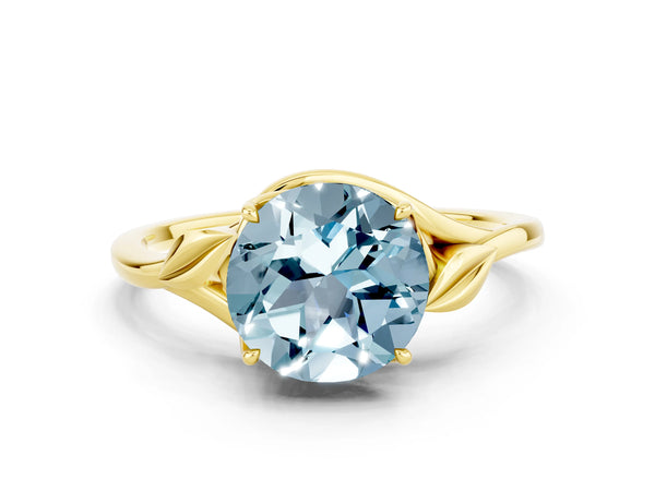 Yellow gold Round Cut Aquamarine Solitaire Ring with Twist Band and Four-Prong Setting